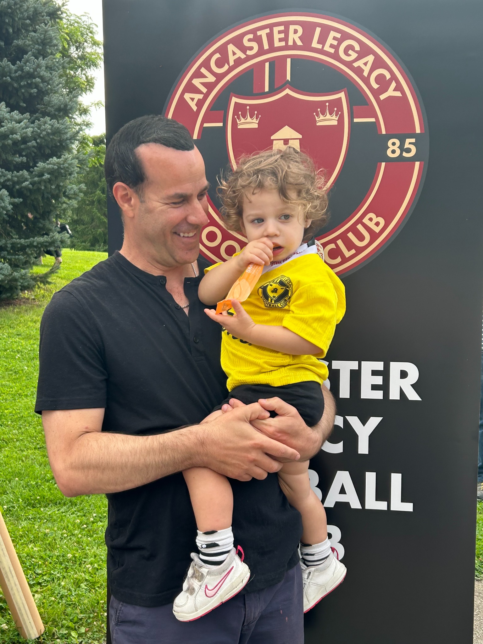 Paul sharing a youth soccer moment with his daughter