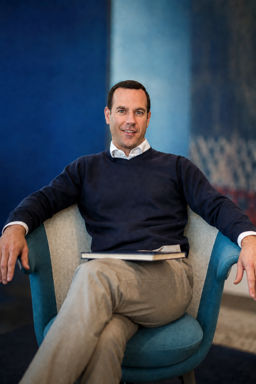 Paul Mercante seated in a professional setting